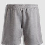 Men's solid color textured elastic waist shorts
