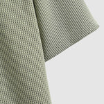 Men's solid color textured fabric casual short-sleeved polo
