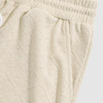 Men's solid color geometric terry texture shorts