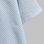 Men's solid color seersucker textured lapel button-down short-sleeved shirt