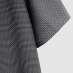 Men's textured soft breathable lapel short sleeve polo
