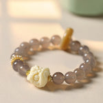 Buddha Stones Amber Gray Agate Ivory Fruit Confidence Bracelet