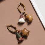 Buddha Stones Natural Green Sandalwood Colored Rope Tassels Star Moon Abundance Key Chain