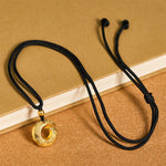 Buddha Stones "Wishing You Good Fortune" 24k Gold Plated Brass Peace Buckle Black Rope Necklace Includes Gift Message Card