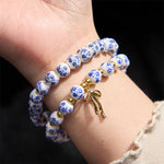 Buddha Stones Blue And White Pink Porcelain Beaded Bowknot Beaded Inner Peace Bracelet