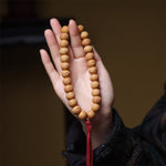 FREE Today: Wisdom and Grounding Phoenix Eye Bodhi Tibetan Engraved Tassel Wrist Mala