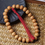 FREE Today: Wisdom and Grounding Phoenix Eye Bodhi Tibetan Engraved Tassel Wrist Mala