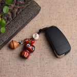 Buddha Stones Ebony Wood & Red Sandalwood Hand Carved Cat Bell Protection Keychains