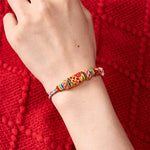 Buddha Stones Hand-Woven Peach Blossom Koi Fish Success Rope Bracelet