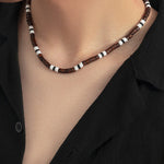 Bohemian polymer clay and wood bead collarbone necklace