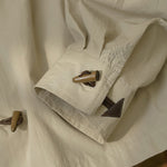 Horn Buttoned Loose Pointed Collar Shirt