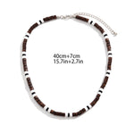 Bohemian polymer clay and wood bead collarbone necklace