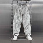 Loose-fitting Breathable Mesh Scimitar Casual Pants