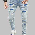 Men's ripped zipper access frayed jeans