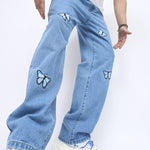 Butterfly embroidered straight-leg jeans