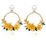 Elegant Gold Earrings with Flowers and Pearls