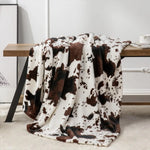 Frontier Cowprint Plush Blanket