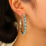 Graceful Silver Hoop Earrings