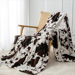 Frontier Cowprint Plush Blanket