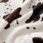 Frontier Cowprint Plush Blanket