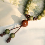 Buddha Stones Green Sandalwood Positive Peace Bracelet