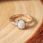 White Opal Three-Stone Gold Ring