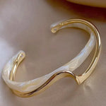 White opal elegant golden bracelet